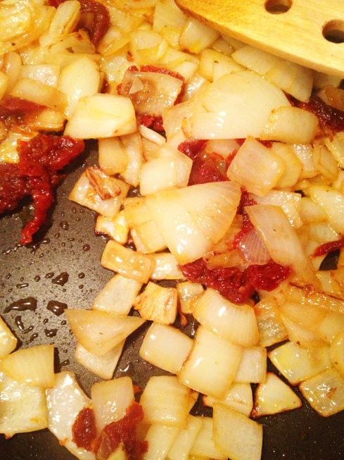 Diced onion and sun-dried tomato. 